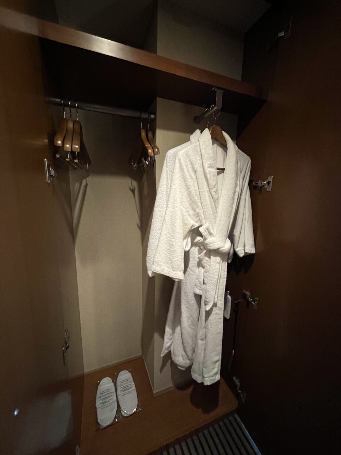 bathrobe and slippers in closet at Hyatt Regency Tokyo