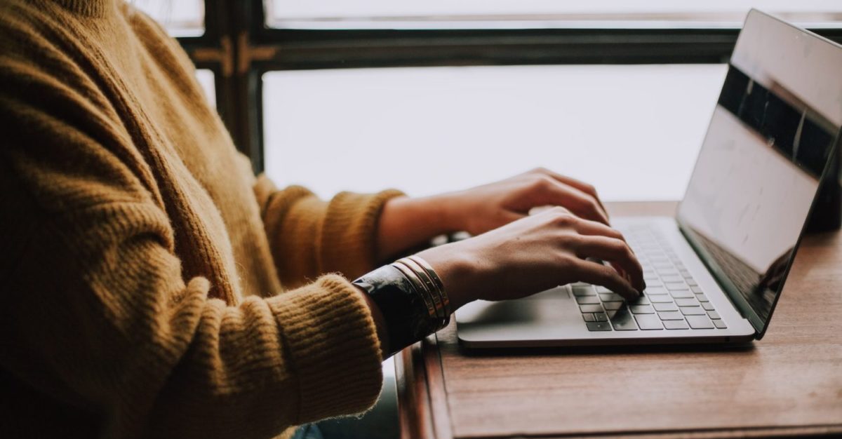 A person using a laptop computer