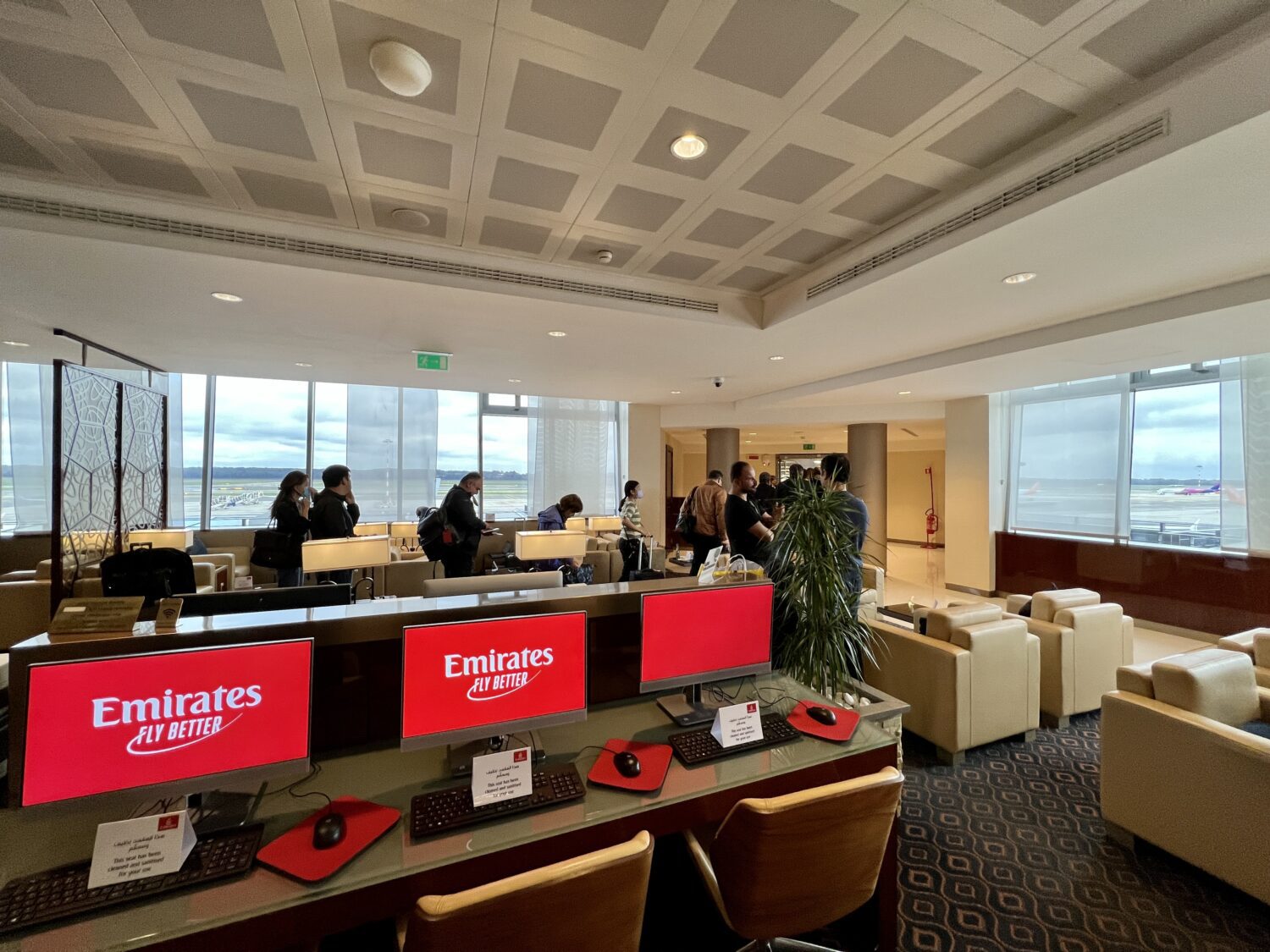 computers at a desk in emirates lounge