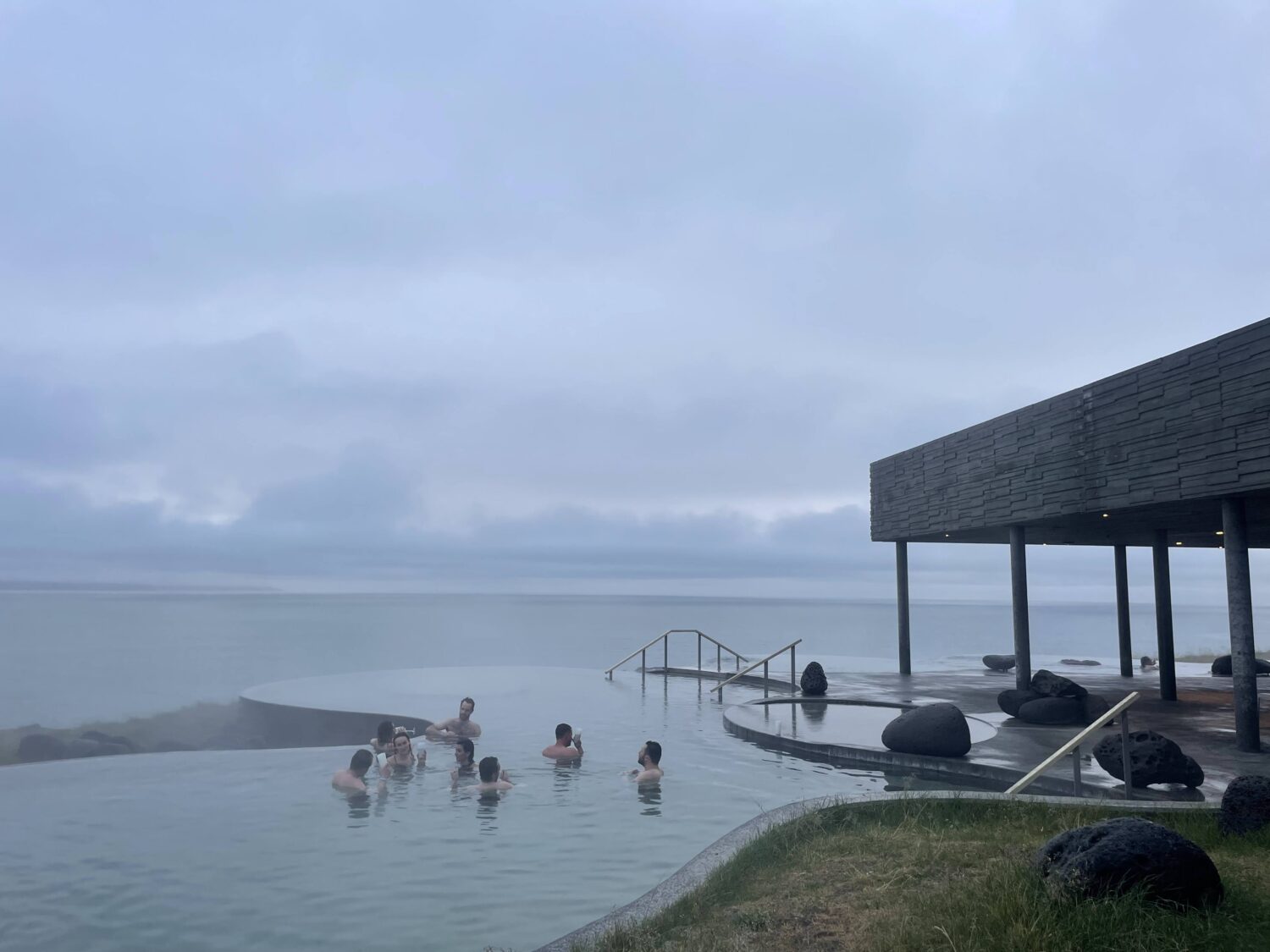 Visitors relax in the Blue Lagoon's hot springs