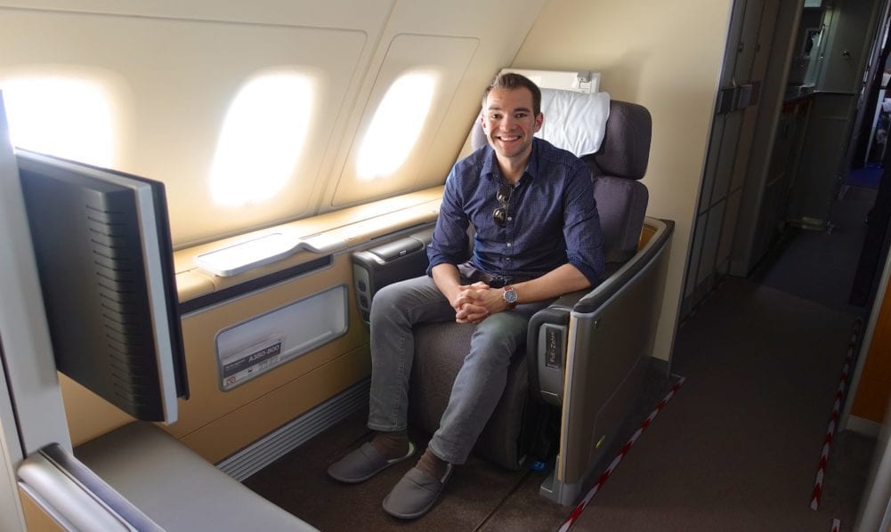 A man sitting in Lufthansa first class